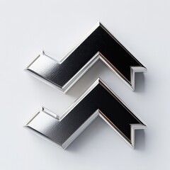 Fototapeta premium Two mirrored, shiny silver shapes, each with a reversed, angled corner, sitting on a white surface