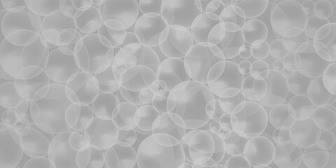 Fototapeta premium Gray and white bokeh from natural. White Bookeh. A brilliant blurry white background for a festive mood. Template for greeting card for entertainment.Gray and white bokeh from natural.