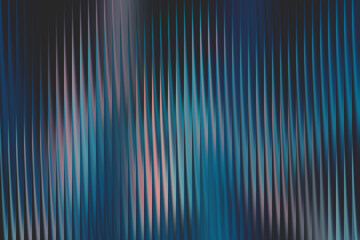 A mesmerizing blue abstract background featuring a sleek vertical line pattern, perfect for creating a modern and sophisticated visual impact
