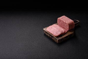 Spiced ham slices, canned meat for lunch sandwiches. Spiced ham as a food background