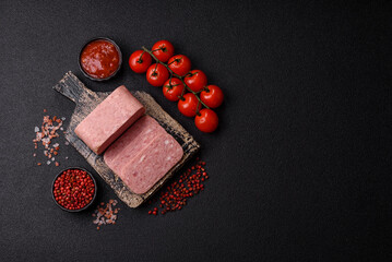 Spiced ham slices, canned meat for lunch sandwiches. Spiced ham as a food background