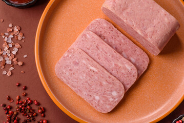 Spiced ham slices, canned meat for lunch sandwiches. Spiced ham as a food background
