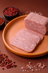 Spiced ham slices, canned meat for lunch sandwiches. Spiced ham as a food background