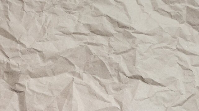 Stop motion animation paper texture background. 4k quality Crumpled Brown Paper