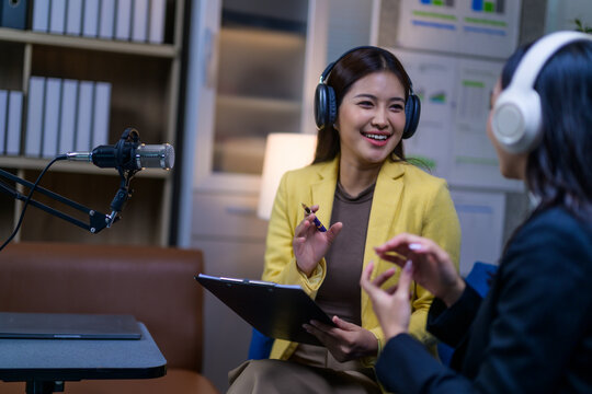 Women broadcasting a podcast interview in studio