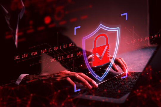 Cybersecurity concept showing hacker attempting data breach while digital padlock icon highlights secure network protection technology. Suitable for threat detection or IT security themes.