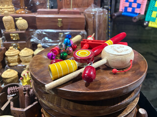 Various traditional, handmade wooden toys rattles and decorative items