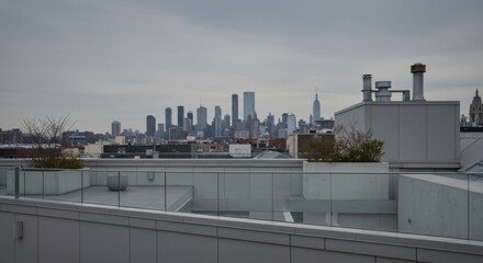 Urban panorama showcasing the iconic New York City skyline under a cloudy sky
