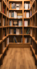 Blurred Bookshelves A Cozy Library Ambiance with Warm Wooden Tones.