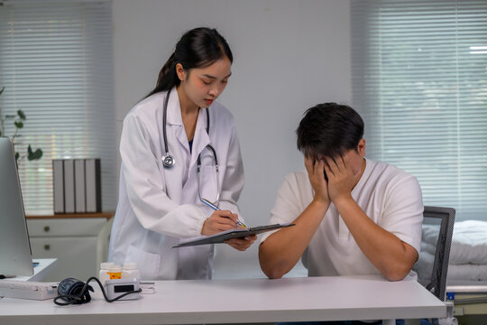 Doctor discussing serious diagnosis with upset male patient