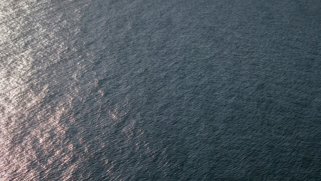 Aerial view drone top shot of over tropical sea. Royalty high-quality free best stock of beautiful wave calm, blue water surface background, top view texture. Turquoise sea backgrounds, paradise relax