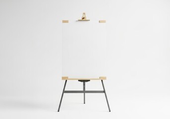 Minimalist art studio setup with easel and stool against a plain wall