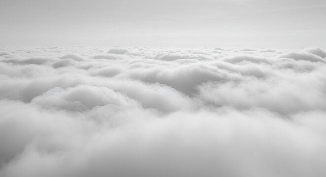 Above the Clouds A Serene Perspective of the Heavenly Sky in Black and White