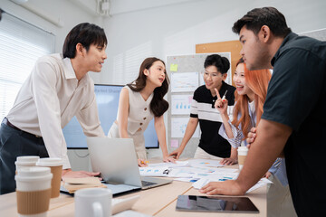 Group of creative Businesspeople brain storm meeting presentation,discussing roadmap to product launch, planning,strategy,dashboard,new business development,working with new startup project in office