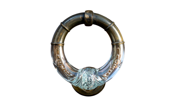 Ornate brass door knocker in a ring shape