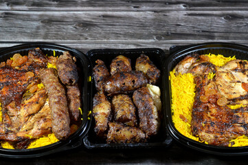 traditional food beef  Kofta and tarb, kofta shish which is minced meat with Basmati rice , oriental grilled barbecued meat food with long yellow rice and charcoal grilled barbecued chicken