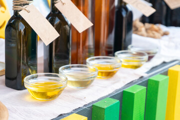 Assorted vegetable oils at farmers market stall