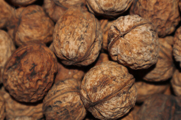 Horizontal close-up of old walnut nuts