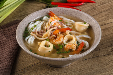 Vietnamese Pho Bo soup with seafood