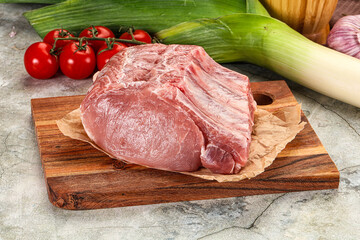 Raw pork loin cut with bone