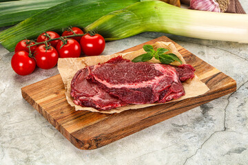 Raw beef cheeks cut for cooking
