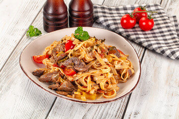 Asian udon noodles with beef