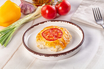 Chicken chop cutlet with cheese and tomato