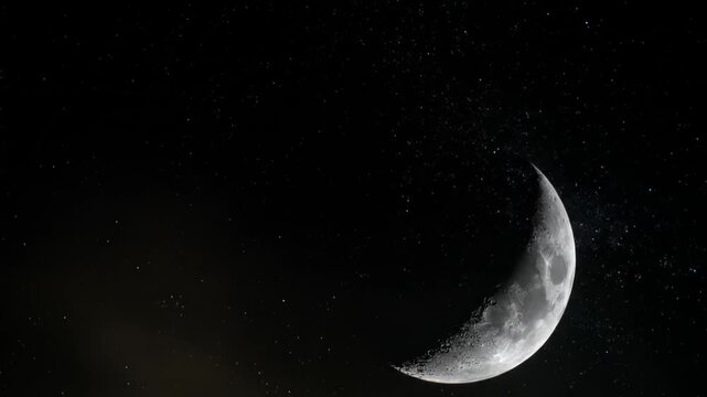 Crescent Moon with Textured Surface against Starry Night Sky Depicting Celestial Body