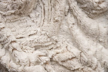 Natural fabric furry and cosy plush textile background