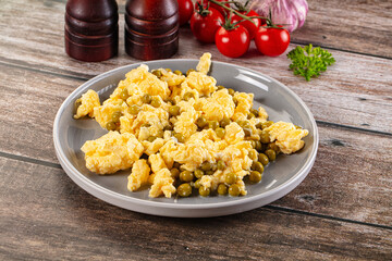 Scrambled egg omelet with green peas