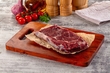 Gourmet raw rib eye steak