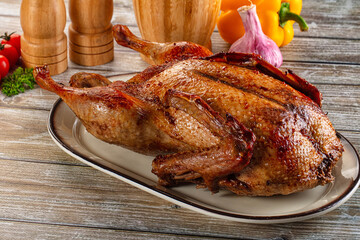Baked with spices whole duck