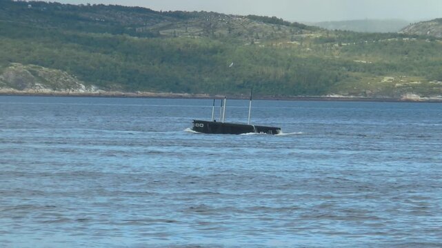  Severomorsk, RUSSIA - July 31, 2016. Day of the Russian Navy.

Diesel-electric submarine  Vladikavkaz  performs an emergency ascent.