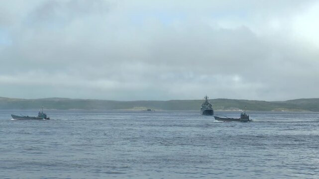 SEVEROMORSK, RUSSIA - July 31, 2016. Day of the Navy of Russia. Landing boats with self-propelled howitzers on Board swim to shore. Editorial use.
