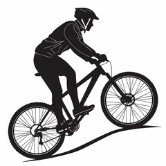 Silhouette of a mountain biker riding on a trail