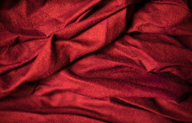Red silk fabric, can be used as a background, texture.