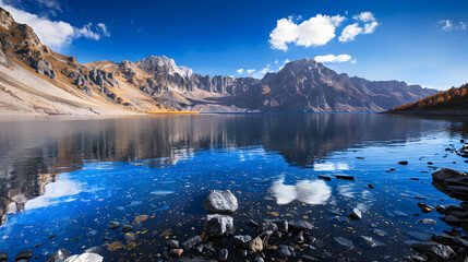The Changbaishan Tianchi: A Majestic Volcanic Crater Lake on the China-North Korea Border in Jilin, China—Boasting Crystal-Clear Blue Water, Surrounded by Snow-Capped Peaks & Coniferous Forests, Ideal