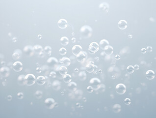 Many translucent bubbles floating in a light blue background