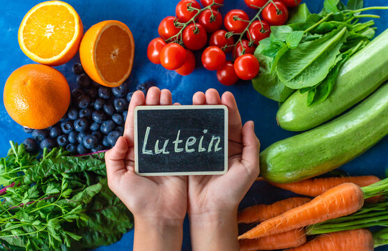 Foods containing lutein on a beautiful background. Selective focus.