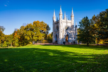 Obraz premium Beautiful autumn landscape in the park. Gothic chapel in Alexandria Park, Peterhof, Saint Petersburg, Russia