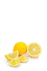 Whole, Halved, and Sliced Lemons on a White Background