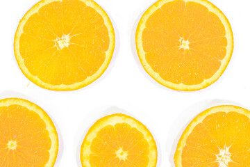 Sliced Valencia Oranges on a White Background