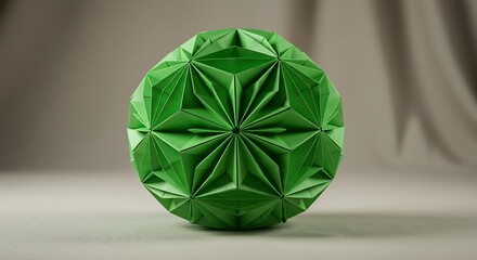 Geometric origami sphere a green paper craft on a neutral background