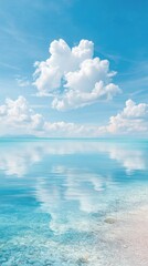Clear turquoise sea with white clouds and reflections