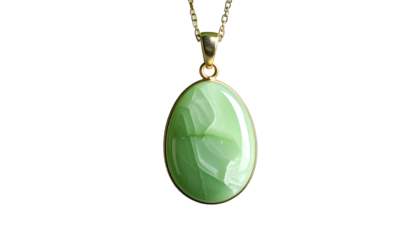 Green gemstone egg-shaped pendant with gold chain, on black backdrop