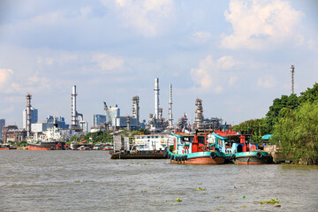 panorama view of Oil and gas industry,  factory - petrochemical plant, refinery and transportation under sun light whit beautiful blue sky,  Bang jak, Bangkok, Thailand © MMxeon