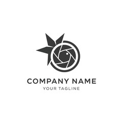 A modern black and white logo featuring a camera lens aperture combined with a star or leaf design, suitable for a photography business.