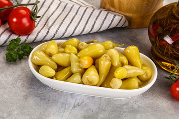 Turkish traditional marinated mini chili peppers