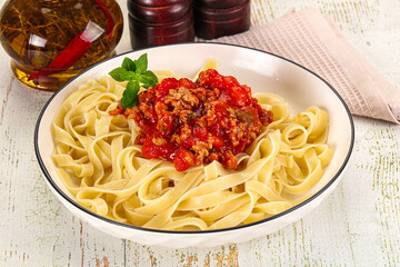 Italian pasta linguine Bolognese with meat