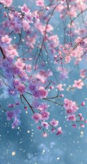 Blooming pink blossoms against a dreamy, glowing blue sky